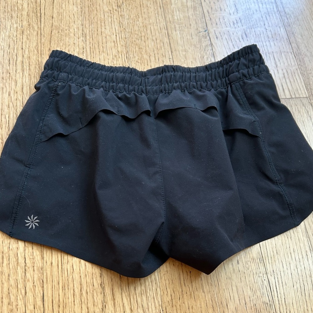 black Athleta Girl  2.5 shorts girls size 7 but stretchy material and waistband.